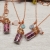 Tiny Bottle Pendant filled with Rose Petals on a Copper Chain
