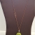 Ceramic Turtle Pendant with a Pearl Accent on Copper Chian Ceramic Turtle Pendant with a Pearl Accent on Copper Chian