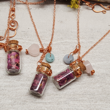 Tiny bottles filled with rose petals